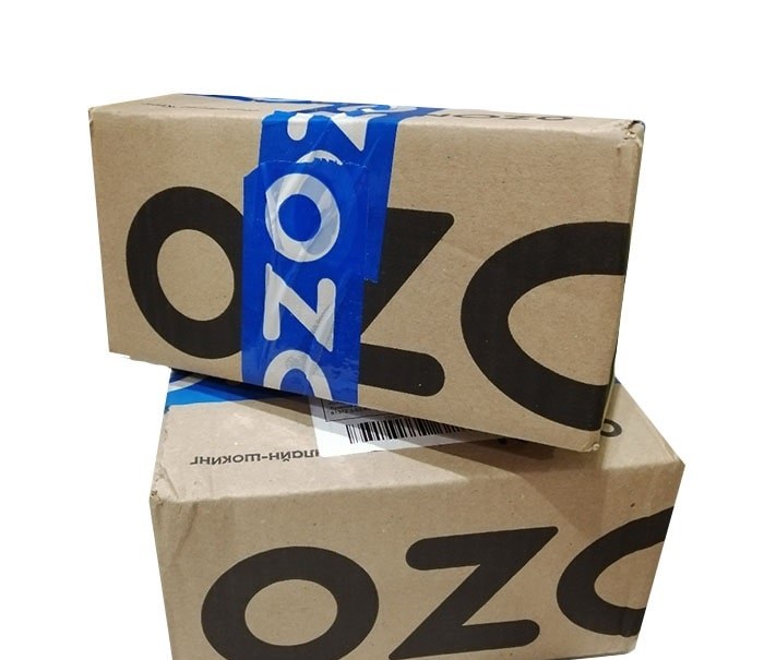 Короба для отгрузки на склад Ozon, заклеенные фирменной лентой